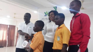 Assokor-Essaman D/A JHS pupils receiving their prize for winning the WAPCo quiz competition