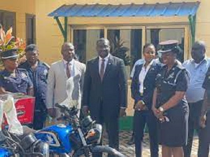 NLA boss Sammi Awuku and others donating the two bikes to the ministry police