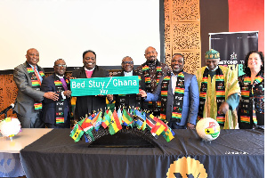 Some Ghanaian residents in Brooklyn and New York clergy displaying the new street name