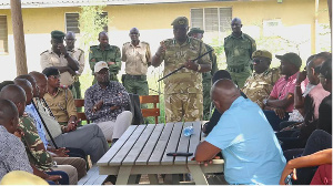 The Kenya Wildlife Service meets with local residents to address human-wildlife conflict in Kajiado