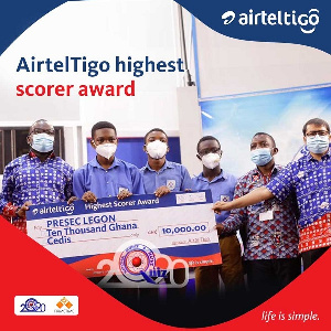 Airteltigo officials presenting the grand prize to winners of the Airteltigo Highest Scorer, PRESEC