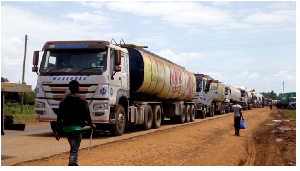 Fuel trucks destined for Uganda queue at Matayos on the Kisumu-Busia highway awaiting clearance