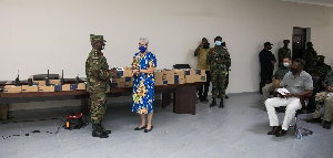 Madam Stephanie S. Sullivan presenting the Chief of Army Staff, Major General Thomas Oppong-Pepprah