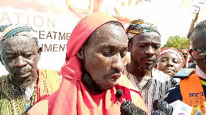 Chairman of the Dalung Youth Association reading a petition