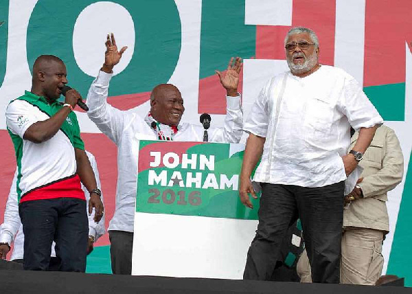 Jerry John Rawlings,Former President of Ghana (Left)