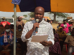 Mr John Hoenyegah, Nabdam District Director, Department of Agriculture speaking at the celebration