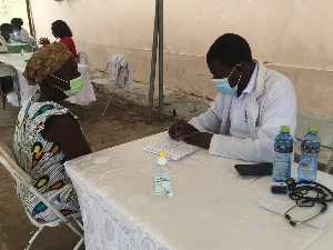 A resident of Mampong-Akuapem undergoing health screening