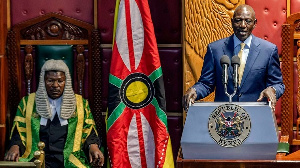 Kenyan President William Ruto (R) next to the Speaker of the National Assembly of Kenya