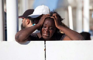 A Woman Cries After Reaching Italy