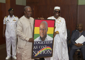 Haruna Attah with Mahama at a public event