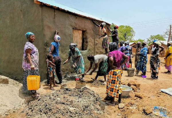 People engaging in communal labour