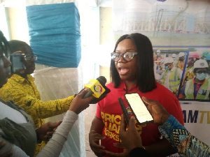 Mrs. Linda Asante interacting with the media