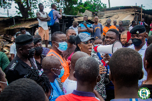 Accra Mayor addresses a cross section of people at the fire scene