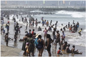 Revellers enjoy New Year's Day on a beach in Durban, South Africa