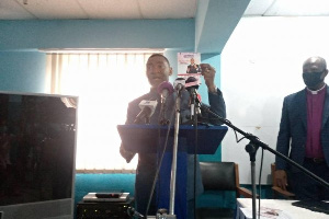 Lawrence Tetteh speaks at a press conference in Accra