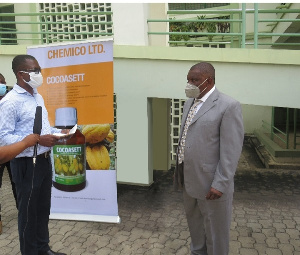 Mr. Gregory Amprofi (left) hands over the cheque to Dr. Nurah Gyeile