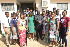 Some of the beneficiary students in a photograph with the Bongo DCE