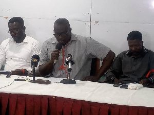 Raphael Kornor (Middle) addressing journalists