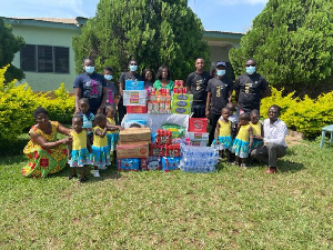 Members of the Mpanya Distribution Center of Zipline making the donation