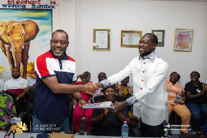 Dr Opoku Prempeh handing over his forms to party chairman