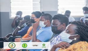 Some participants seated at the meeting