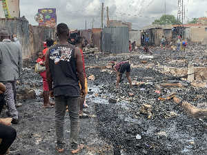 Some of the victims scrambling through the debris for what they can salvage