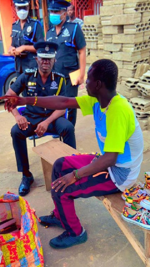 Dr George Akuffo Dampare visited Yussif Iddrisu at his shop following the attack