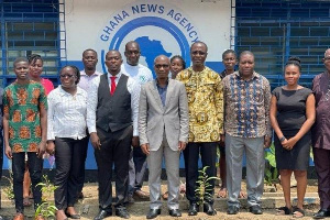 Dr Ayisi Addo of NACP (fourth left) with participants of GNA stakeholder engagement at Tema