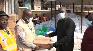 Tobinco Chairman (right) handing over the donation on Friday January 21st 2022