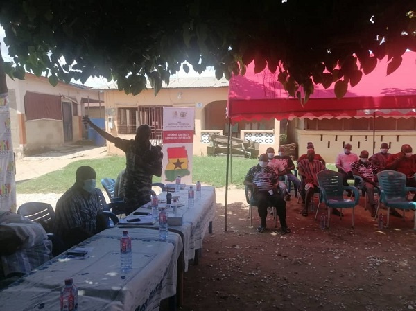 North Tongu District Police Commander A.S.P. Stanley Avorgbedor(R) addressing the youth