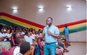 Valentino Nii Noi Nortey speaking at a meeting attended by more than 150 tailors dressmakers