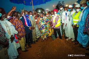 Dr Mahamudu Bawumia cutting sod for a 10-km Berekum town roads