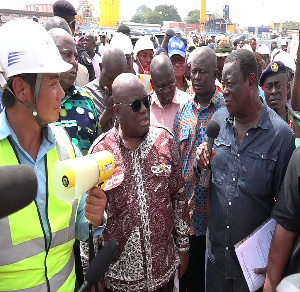 File photo, President Akufo Addo talking to Roads Minister, Kwasi Amoako Atta