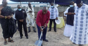 Rev. Dr. Deegbe breaking the ground for the commencement of work