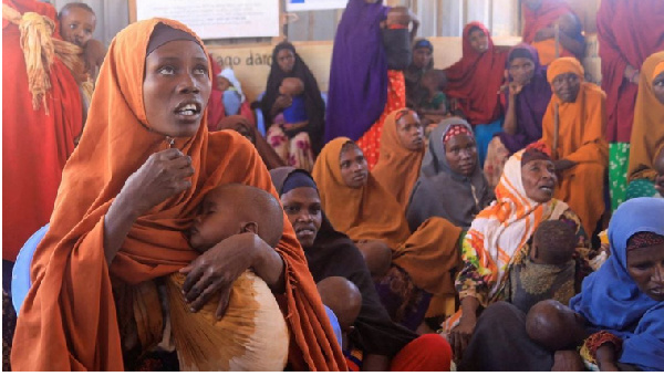 Internally displaced Somali women with their children at the feeding centre in Barwaaqo near Baidoa