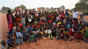 She presented football boots to youth which they requested from her last year