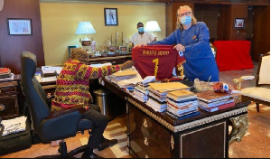 President Akufo-Addo receiving a replica jersey of AS Roma