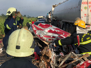 Personnel of the Ghana National Fire Service at the scene of the incident