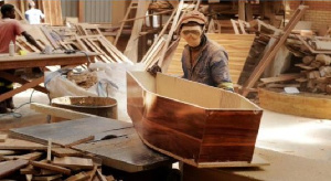 A coffin maker at work