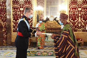 Amb. Muhammad Adam [R] making the presentation