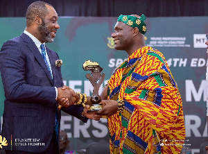 Dr. Matthew Opoku Prempeh receiving his award