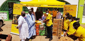 Mr. Obed Adu Amankwah,Area Sales Manager(right) and the Northern Regional Chief Imam(left)