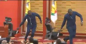 Ernest Norgbey dragging the Speakers chair