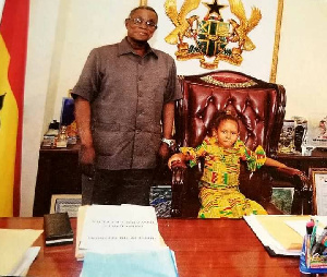 Atta Mills Hosts Little Girl In Presidential Seat.jfif