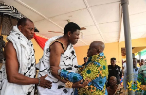 President Akuro-Addo embracing Nana Oseadeayo Akumfi Ameyaw IV