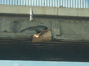 The part of the overpass damaged through the accident