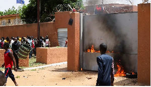 Pro-junta demonstrators gathered outside the French embassy, tried to set it on fire