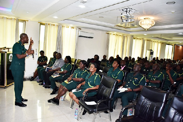 Kwame Asuah Takyi explaining issues on study leave policy to Senior Officers