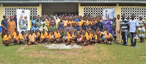 Officials of ENA with some pupils