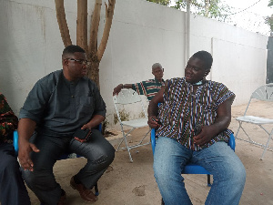 Alhaji Amadu(L) in a tête-à-tête with Dr. Wahab Agbeve